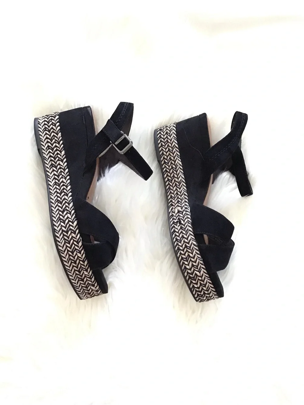Tamari’s Black Suede Cross-Strap Wedge Sandals